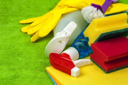 Technician using insured carpet cleaning equipment in a home